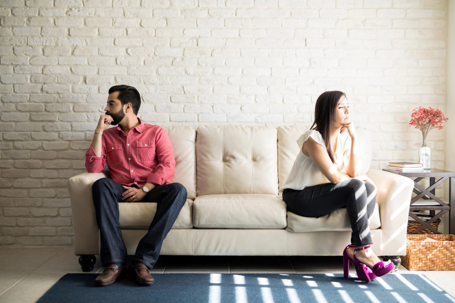 Annoyed couple ignoring each other how to take a step back in a relationship - not talking