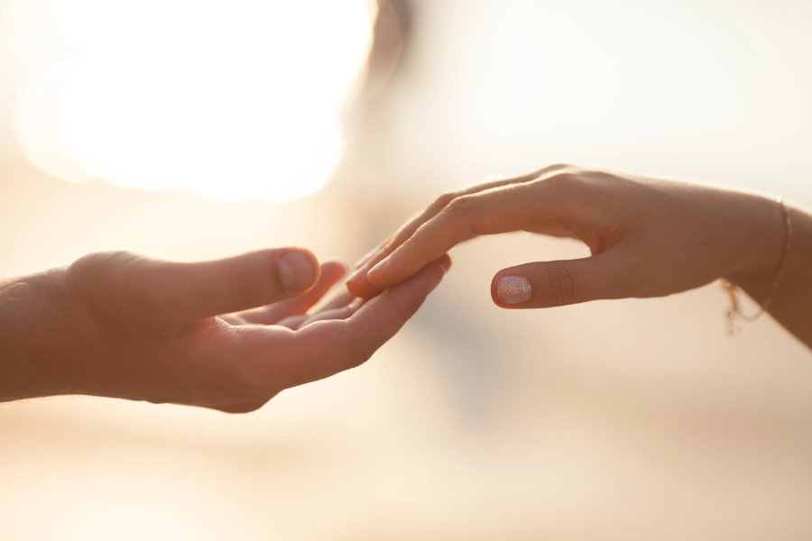 how to support your partner in difficult times - hands holding how to support your partner in difficult times - hands holding